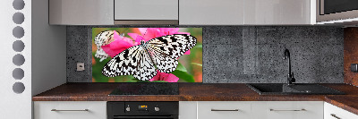 Spatscherm keuken Vlinder op een bloem