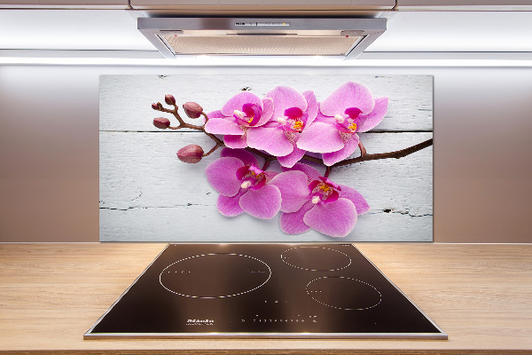 Glazen achterwand keuken Orchidee op hout