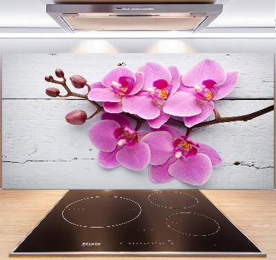 Glazen achterwand keuken Orchidee op hout