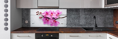 Glazen achterwand keuken Orchidee op hout