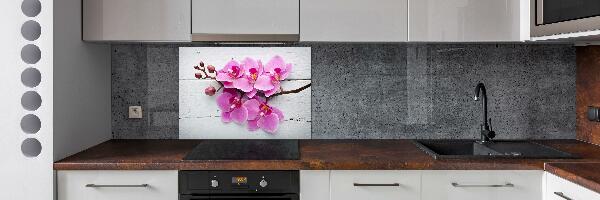 Glazen achterwand keuken Orchidee op hout