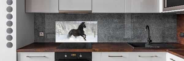 Achterwand keuken Een paard dat galoppeert in de sneeuw