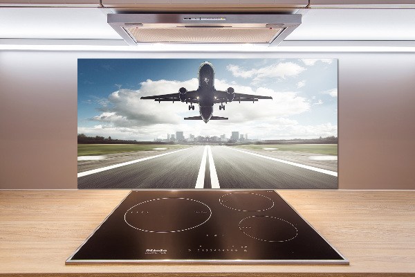 Keuken achterwand Een vliegtuig dat opstijgt