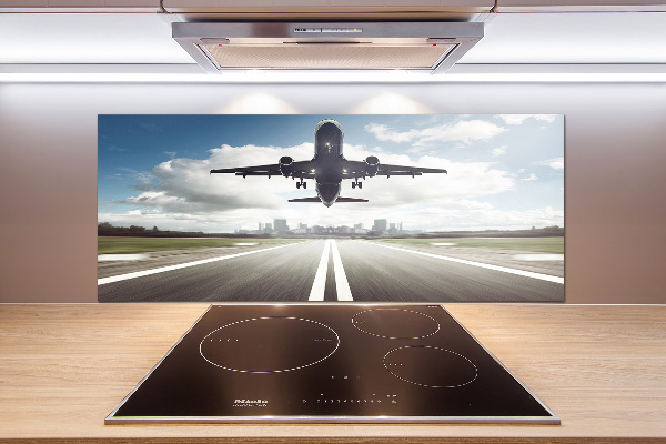 Keuken achterwand Een vliegtuig dat opstijgt