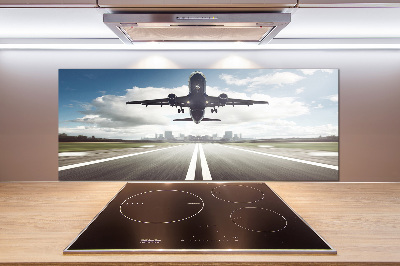 Keuken achterwand Een vliegtuig dat opstijgt