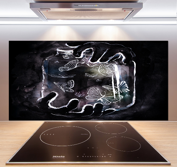 Glazen achterwand keuken Vlinders in een pot