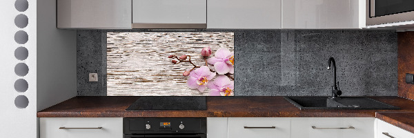 Glazen achterwand keuken Orchidee op hout