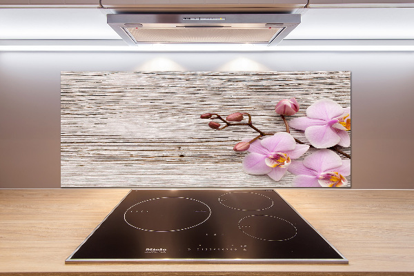 Glazen achterwand keuken Orchidee op hout