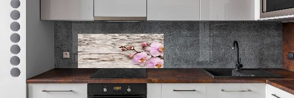 Glazen achterwand keuken Orchidee op hout
