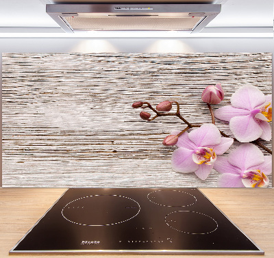 Glazen achterwand keuken Orchidee op hout