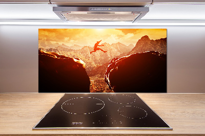 Spatscherm keuken Spring over de afgrond