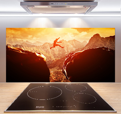 Spatscherm keuken Spring over de afgrond