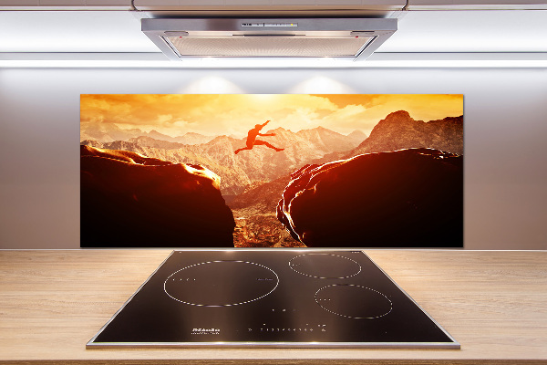 Spatscherm keuken Spring over de afgrond