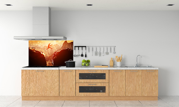 Spatscherm keuken Spring over de afgrond