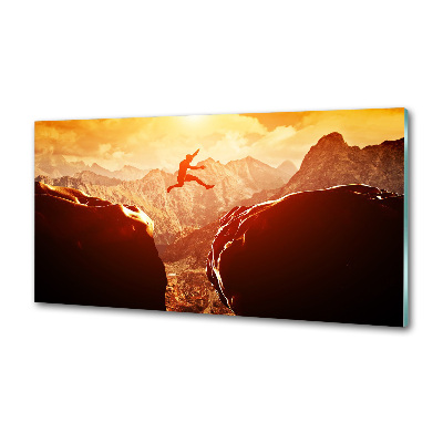 Spatscherm keuken Spring over de afgrond