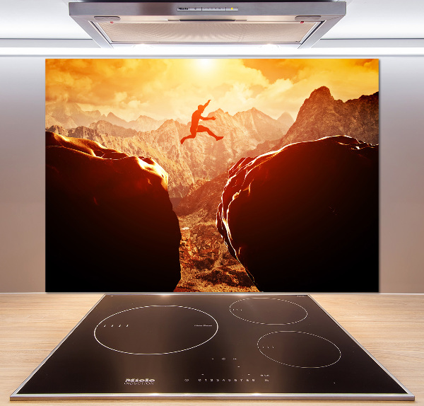 Spatscherm keuken Spring over de afgrond