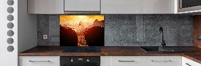 Spatscherm keuken Spring over de afgrond