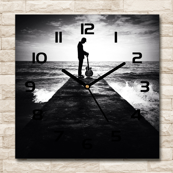 Vierkante glas klok Gitarist op de pier