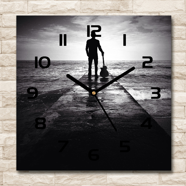 Vierkante glazen klok Gitarist op de pier