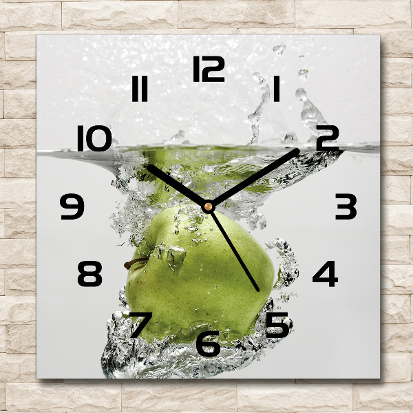 Vierkante glazen klok Een appel onder water