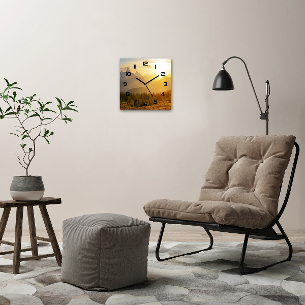 Vierkante glazen klok Zonsondergang boven de bergen