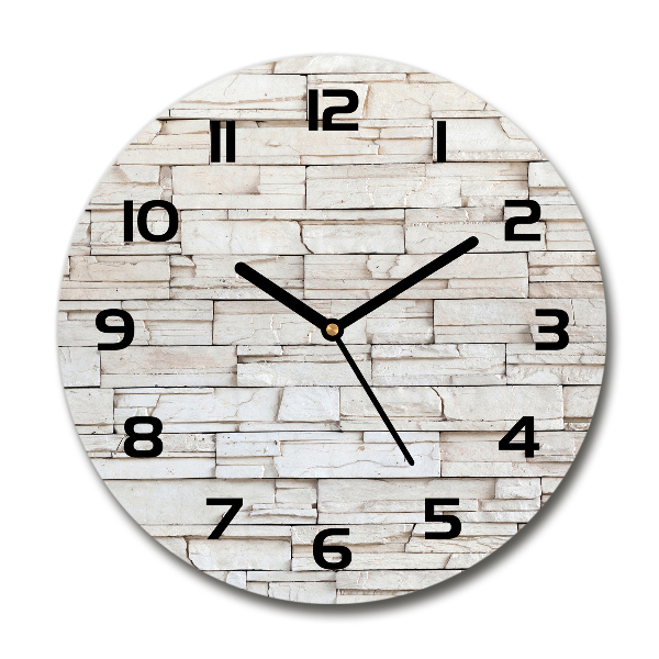 Ronde glas klok Witte stenen muur