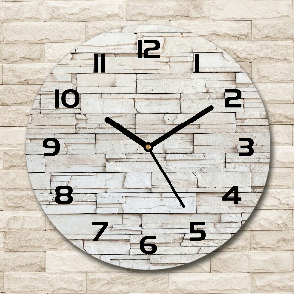 Ronde glas klok Witte stenen muur