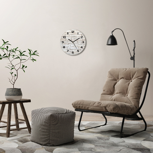 Ronde glas klok Witte stenen muur