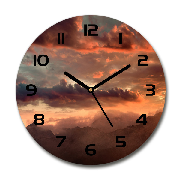 Ronde glazen klok Zonsondergang boven de bergen