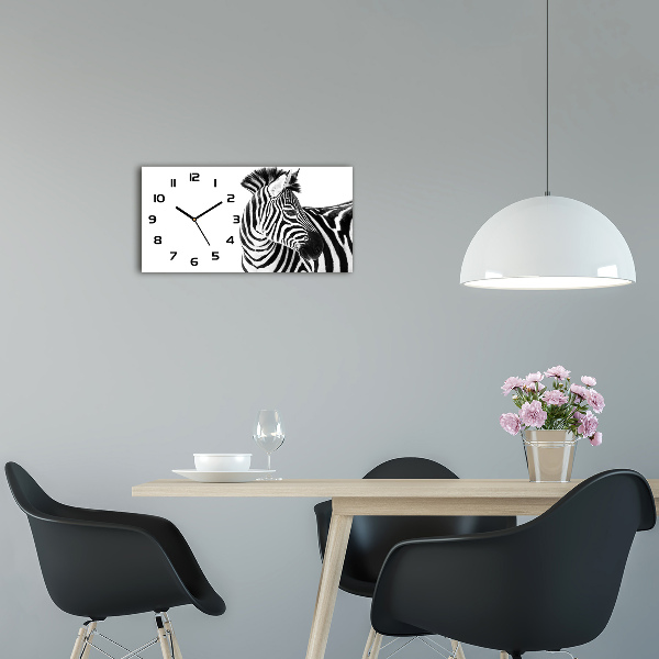 Langwerpige wandklok van glas Zebra in de sneeuw