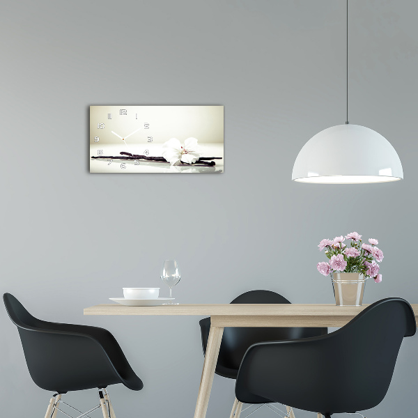 Langwerpige wandklok van glas Vanillestokje