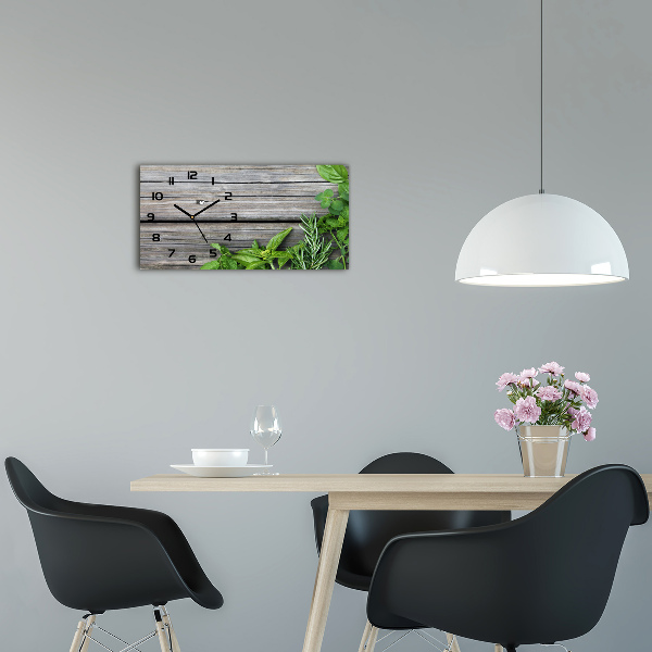 Glazen klok horizontaal Houten kruidenachtergrond