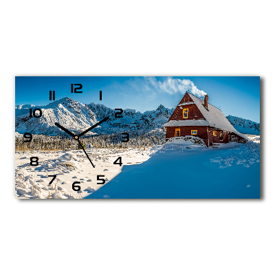 Langwerpige wandklok van glas Een huisje in de bergen