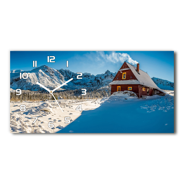Langwerpige wandklok van glas Een huisje in de bergen