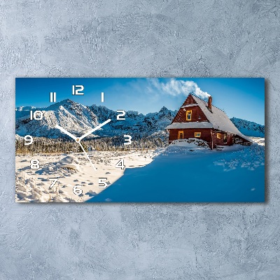 Langwerpige wandklok van glas Een huisje in de bergen