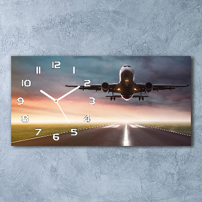 Glazen klok horizontaal Een vliegtuig dat opstijgt