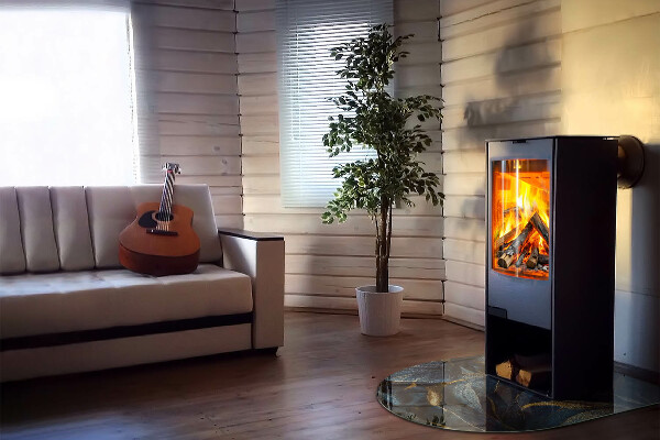 Halfronde plaat onder houtkachel Stijlvolle bladeren in de structuur