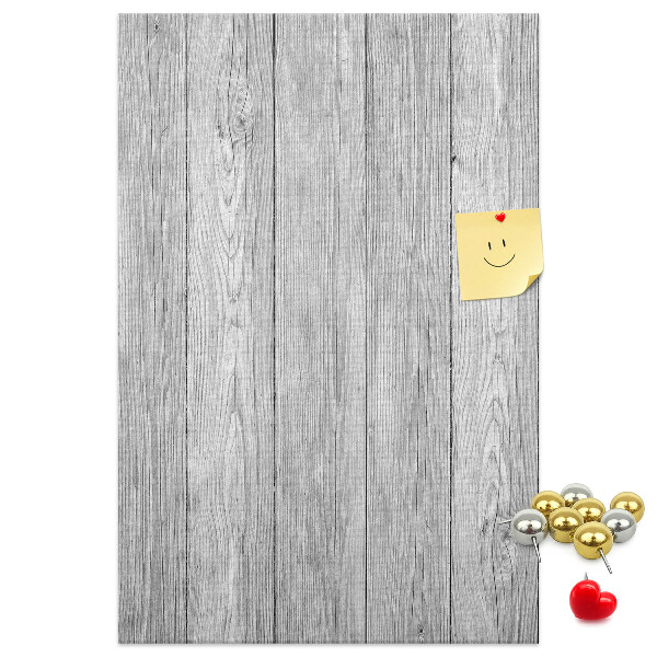 Kurken prikbord met een achtergrond van grijze houten planken