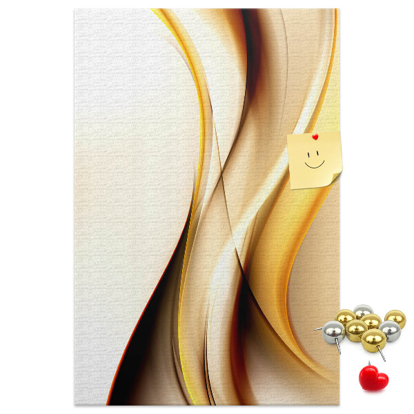 Memobord van kurk met elegante gouden golven op een lichte achtergrond
