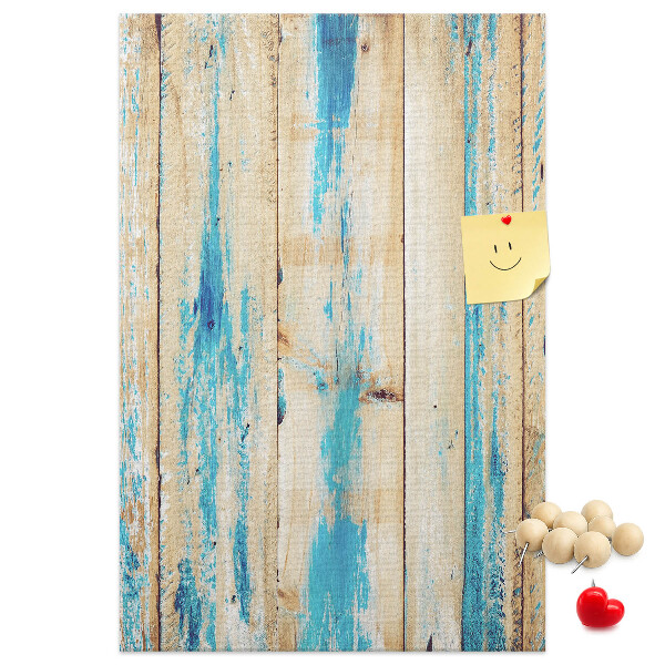 Kurken prikbord oud houten paneel met blauwe accenten