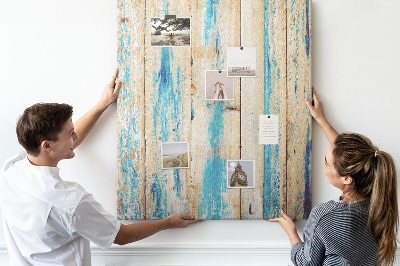 Kurken prikbord oud houten paneel met blauwe accenten