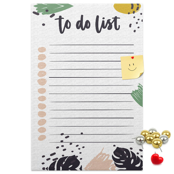 Kurken prikbord met een print van kleurrijke bladeren op een takenlijst