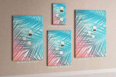 Memobord van kurk met tropische palmbladeren in pasteltinten