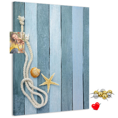 Kurken memobord met een maritieme uitstraling voorzien van blauwe planken en een schelp