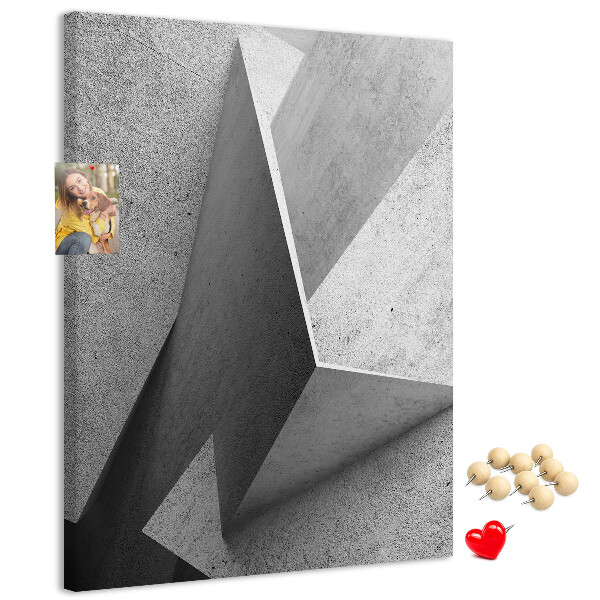 Prikbord van kurk met betongeometrie in grijstinten