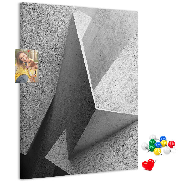 Prikbord van kurk met betongeometrie in grijstinten