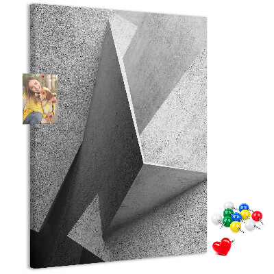 Prikbord van kurk met betongeometrie in grijstinten