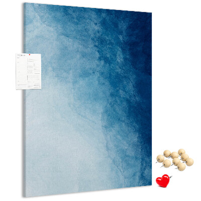 Kurken prikbord met een fijn geweven patroon in verschillende blauwtinten