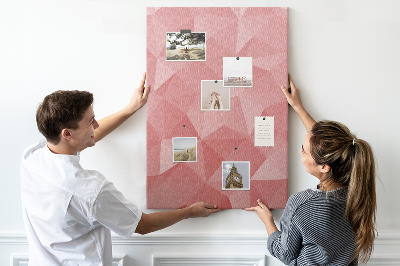 Kurken memobord met abstract roze geometrisch driehoekspatroon
