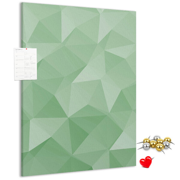 Prikbord van kurk met geometrische vormen in groene tinten